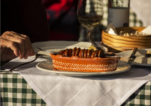 Table with chorizo and wine